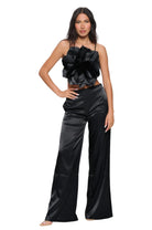 Elegant black women's vacation outfit for women set with floral top and wide-leg pants