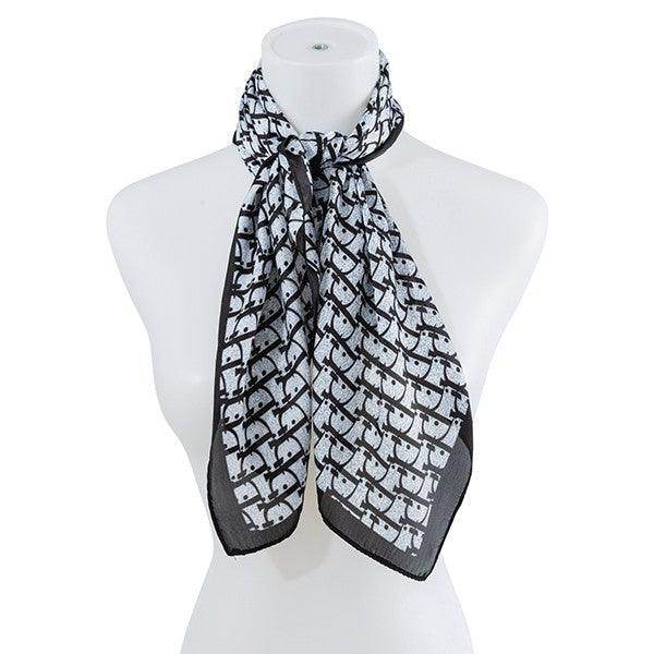 Bella Chic luxury vacation scarf in black and white pattern, perfect accessory for stylish travel