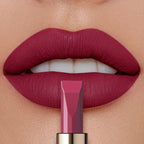 Matte lipstick MAC in deep plum color for a bold look