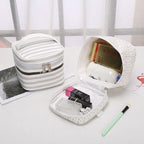 White striped makeup bag cosmetic for organizing beauty essentials