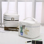 White makeup bag cosmetic with cactus design for travel organization