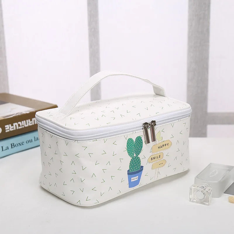 White makeup bag cosmetic with cactus design for travel convenience