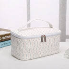 White makeup bag cosmetic with stylish pattern for travel organization