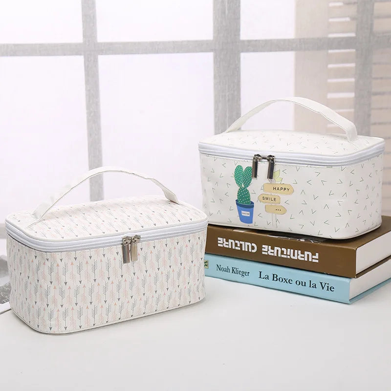 VacationGrabs makeup bag cosmetic set in white with stylish designs for organizing beauty products