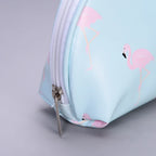 Light blue makeup bag with pink flamingo design, perfect for travel