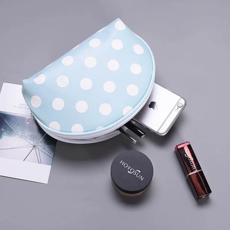 Blue polka dot makeup bag for storing cosmetics and essentials