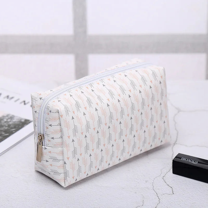 VacationGrabs makeup bag with geometric arrow pattern for organizing cosmetics