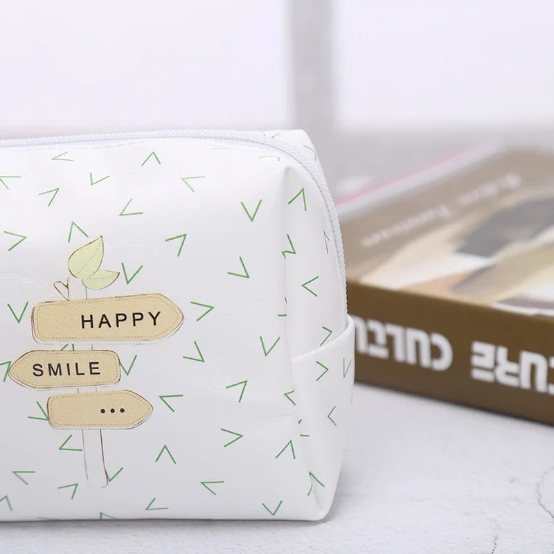 White makeup bag with cheerful signs for organizing cosmetics