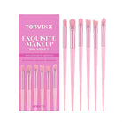 Pink makeup brush set with soft synthetic bristles for applying makeup palettes