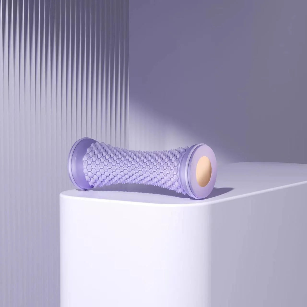 Purple manual foot massager roller for relaxation and foot therapy