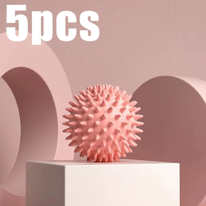 Pink spiky massage ball for muscle relaxation, ideal for stress relief