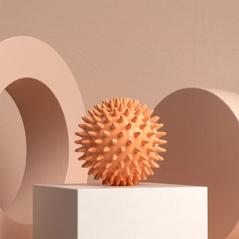 Peach massage ball for muscle relaxation, perfect for stress relief