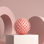 Pink spiky massage ball for muscle relaxation and tension relief