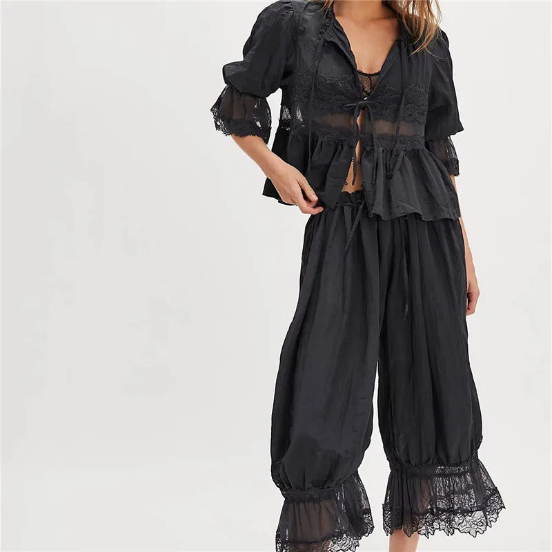 Women's black lace matching Christmas family pajama sets for cozy holiday gatherings