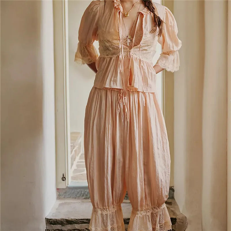Women's matching Christmas family pajama sets in soft peach color