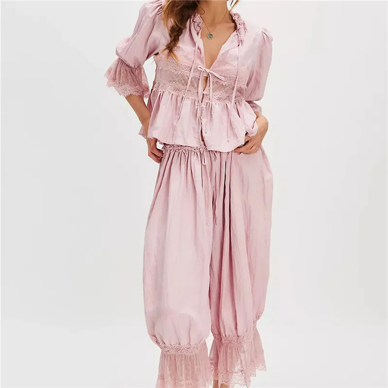 Women's pink satin matching Christmas family pajama sets for cozy celebrations