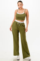 Women wearing olive green matching tank and jogger set with white trim and drawstring waist