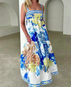Women's floral print maxi dress, lightweight fabric, perfect for summer events.