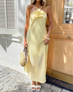 Women's yellow crinkle maxi dress with floral detail for summer outings