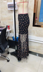 Black maxi skirt with star pattern, perfect for casual outings