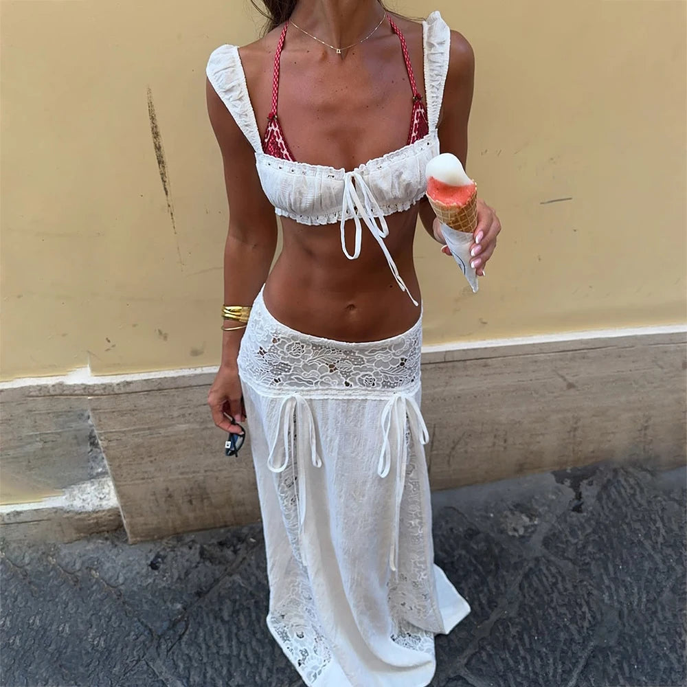 Women's white maxi skirt and cropped top set, perfect for summer outings
