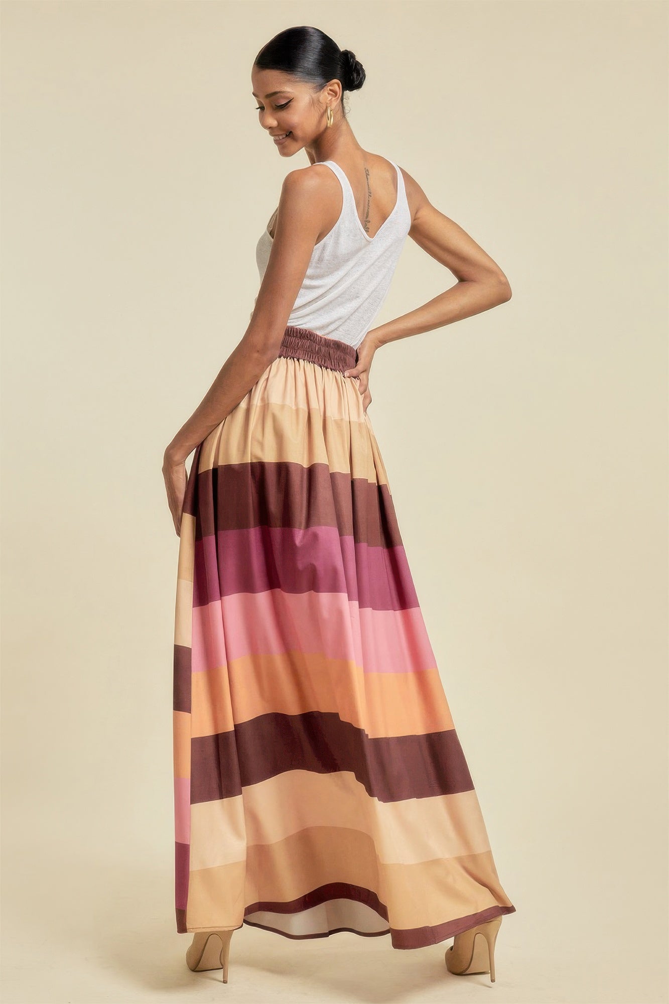 VacationGrabs women's striped maxi skirt with pockets in shades of brown pink and beige
