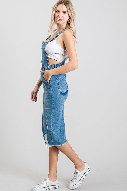 Stylish medium blue overall dress by LITZ LA featuring a mid-length design and side pockets