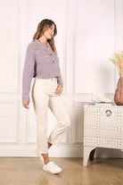 Lilou women's melange knit sweater in purple with button detailing, styled with white pants