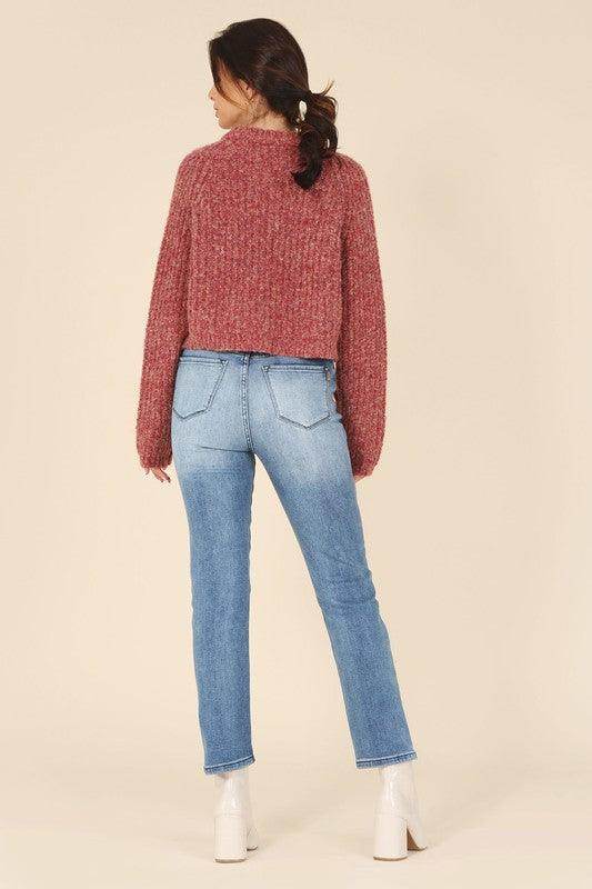 Lilou melange knit sweater in burgundy paired with light denim jeans for a cozy look