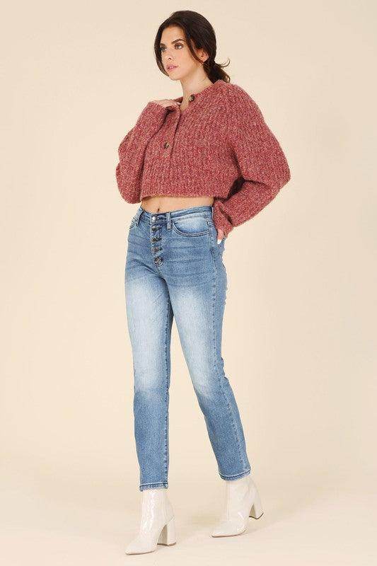 Lilou Women's melange knit sweater in a cropped style paired with light blue jeans for a trendy look
