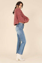 Lilou Women's Melange Knit Sweater in Burgundy Paired with High-Waisted Jeans for a Stylish Look