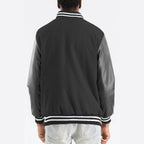 Back view of a Men's Melton varsity jacket by VacationGrabs with striped collar and cuffs