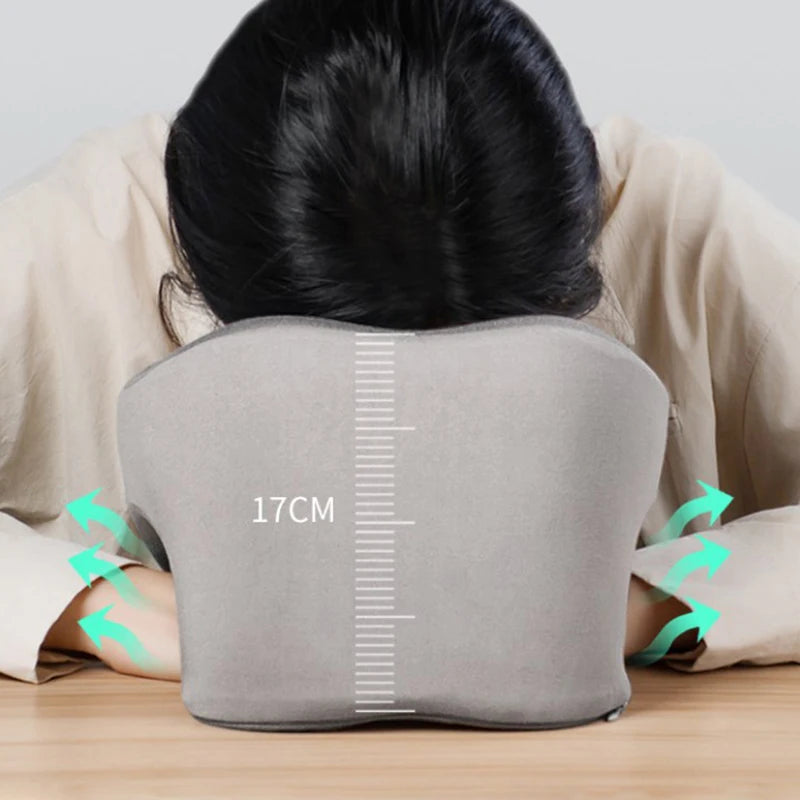 Gray memory foam travel pillow for neck support during travel
