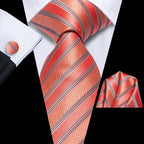 Men professional ties in orange with a striped pattern for formal wear