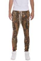 Men's camo track pants featuring a camouflage design with side stripes for a stylish casual look