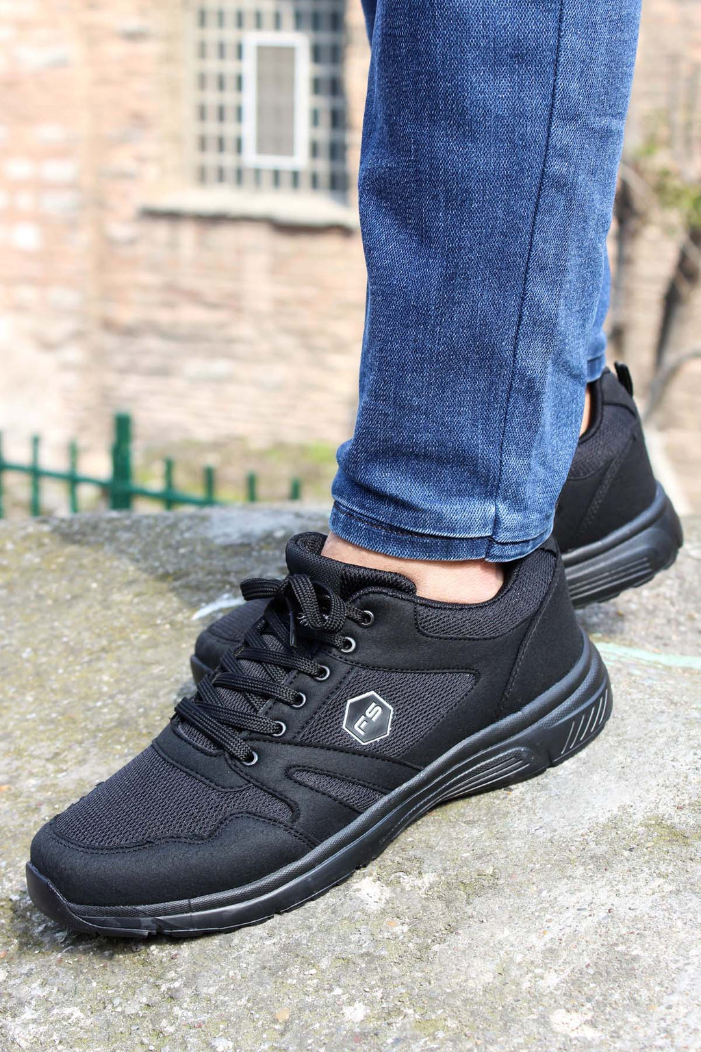 Men's All-Black Athletic Sneakers with Mesh Panels – front view