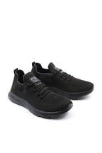 Men's All-Black Knit Sneakers with Flexible Sole – styled view