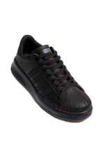 Men's All-Black Leather Low-Top Sneakers with Textured Toe – side view