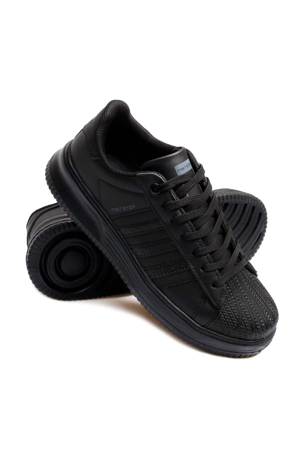 Men's All-Black Leather Low-Top Sneakers with Textured Toe – styled view