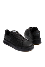 Men's All-Black Leather Low-Top Sneakers with Textured Toe – close up view