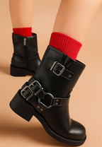 Women's black leather boots with buckles for a stylish look