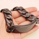 Men's black bracelet with a chunky design, showcasing a glossy finish and modern style