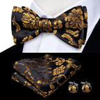men's bow tie in black and gold floral pattern, perfect for formal events