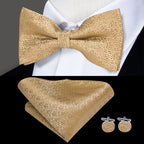Mens bow tie in gold with matching pocket square and cufflinks for formal events