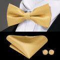 Mens bow tie and matching pocket square set in gold for formal occasions