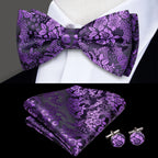 Mens bow tie in purple floral pattern with matching pocket square and cufflinks