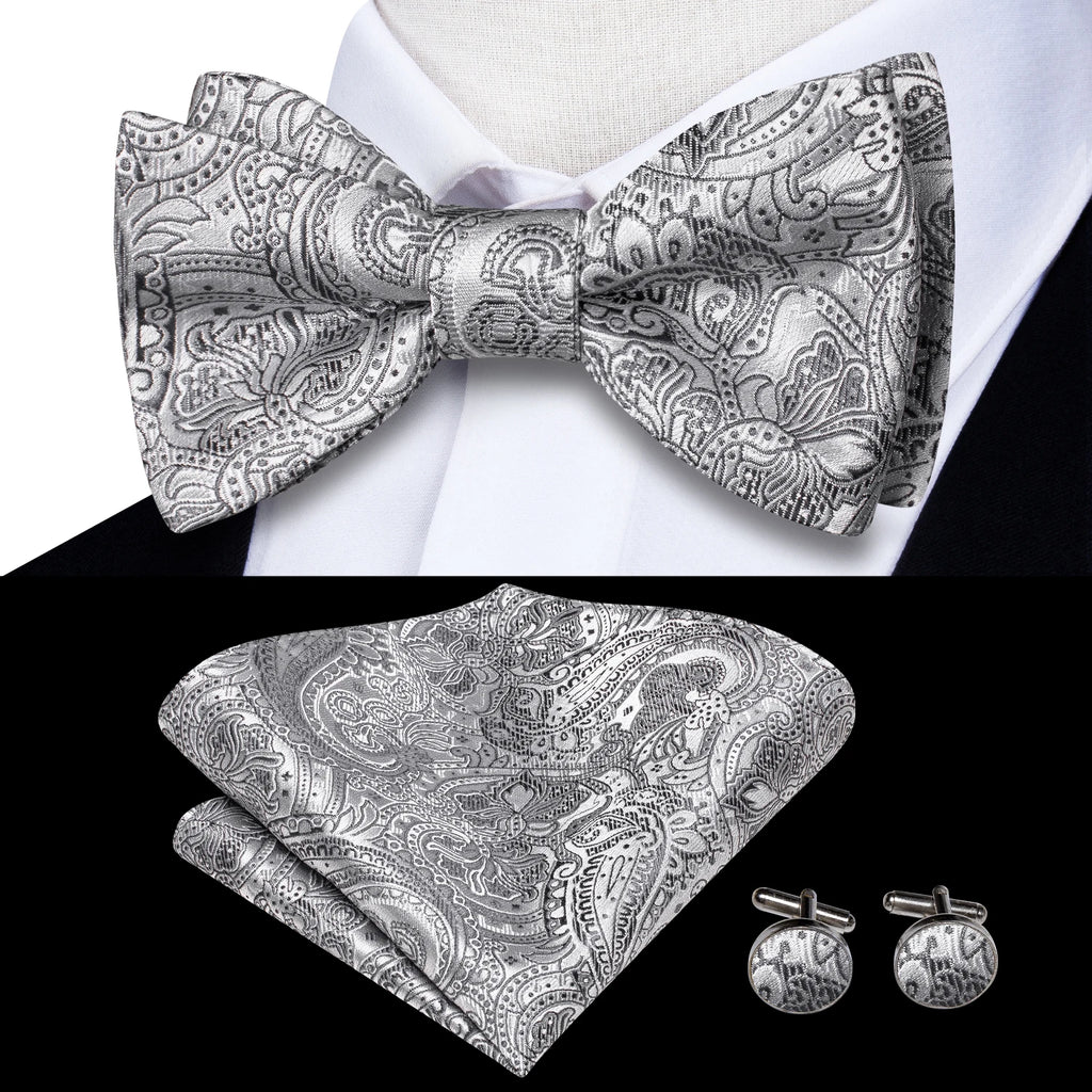 Men's bow tie set in silver paisley pattern with pocket square and cufflinks