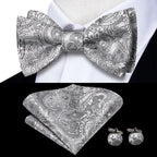 Men's bow tie set in silver paisley pattern with pocket square and cufflinks
