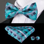 Mens bow tie in teal and navy pattern with matching pocket square and cufflinks