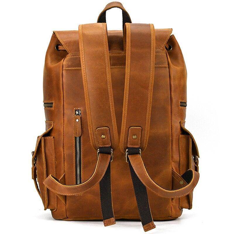 VacationGrabs mens brown leather backpack with multiple pockets and adjustable straps for daily use